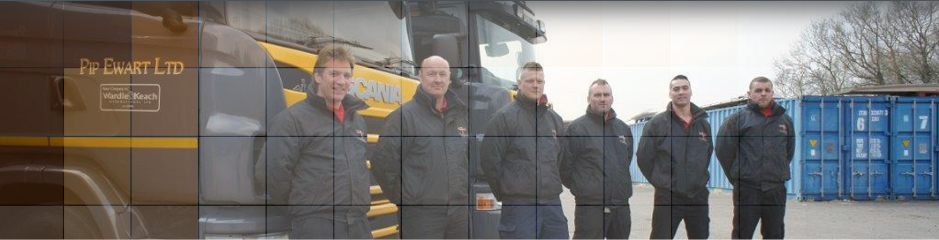 Work men standing outside their company lorries