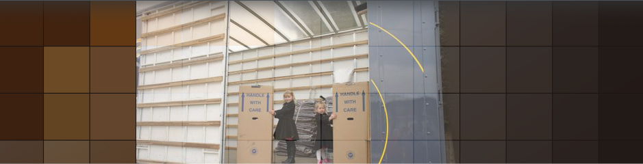 Domestic Removals throughout Leicestershire Children in van helping with 'handle with care' boxes